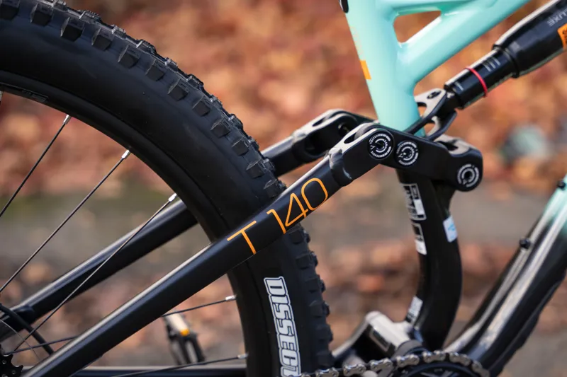 Whyte T-140 27 Junior Full Suspension Mountain Bike in Green with Gloss Green/Coral Orange-7